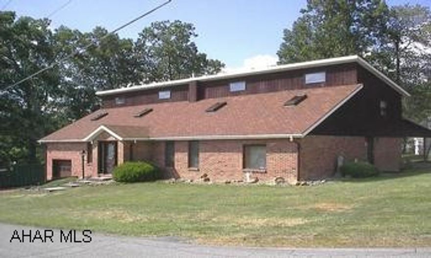 UNIQUE CONTEMPORARY! INDOOR POND AND FOUNTAIN, LG. STONE FIREPLACE, VAULTED CEILING, AREA FOR BAR OR READING RM/OFFICE. 1ST FL. DEN COULD BE 4TH BED. MASTER HAS LG BATH WITH JET TUBS AND 2 WALK-IN CLOSETS. GARAGE AND CARPORT, CENTRAL VAC, SECURITY SYSTEM, INDOOR POOL!  LARGE GREAT ROOM WITH SKYLIGHTS,  VAULTED CEILING, AND 2 STORY STONE FIREPLACE.  CLOSE TO I-99.  QUIET AREA.  SELLER SAYS BRING OFFERS! $5,000 ALLOWANCE FOR UPGRADES OR CLOSING COST. CALL DARLA 934-4663 OR DARLA4HOMES@AOL.COM.