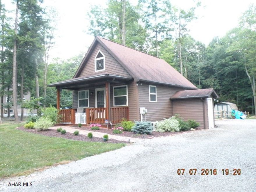 Don't miss this one! 2 BR cottage w/attached garage. Hardwood floors, 1st floor BR, woodburner in basement. All the amenities of GYR. Heated swimming pool, tennis courts, minutes from State Game Lands & Rock Run ATV trails