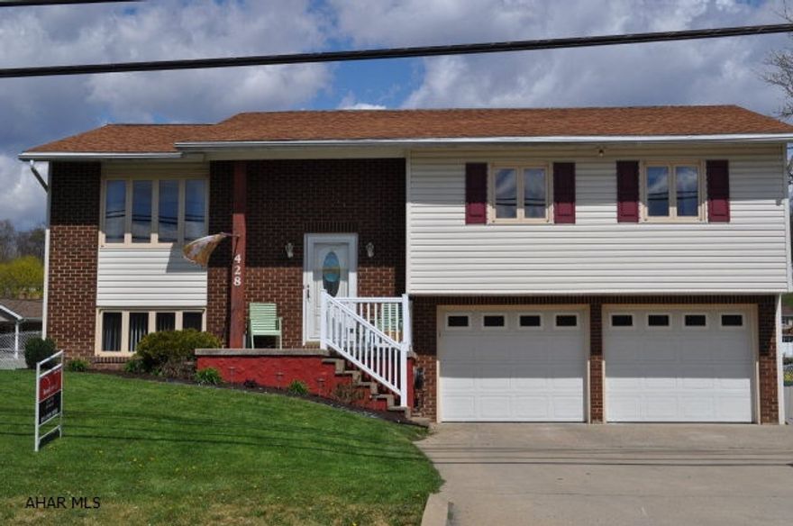 Well done brick & vinyl split entry with fenced yard.  Nice deck off kitchen to watch the kids on the play set.  Everything is freshly painted & new flooring.  Main & master baths are remodeled with granite counters.  Master BR has 3 closets.  New high efficiency electric heat pump w/CA installed & has a transferable warranty.  Well water for garden use only.