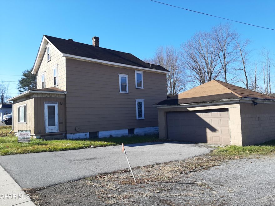 This home was a rental and is in need of some TLC. Home was winterized. Furnace did work. Two car detached garage. Could be a great rental again! Cash only. This property is being sold with 100 Main St. Portage. MLS#73549.  Call for more details.