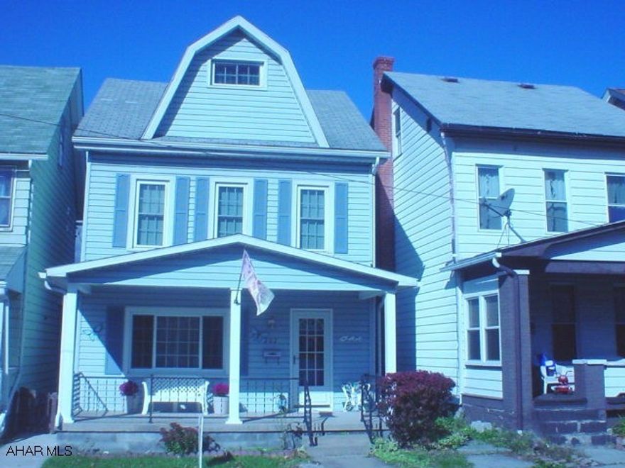 Great 3 bedroom home with open floor plan, bright oak kitchen, updated bath, large bedrooms, & finished 3rd floor. Covered front & rear porches, fenced yard, off-street parking. Home warranty included.