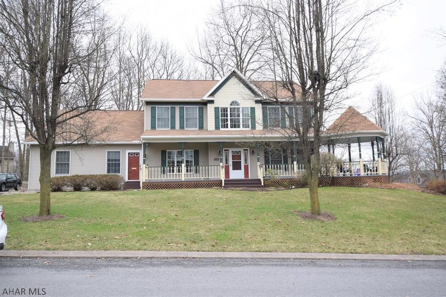 Fabulous home in the Highlands on a well landscaped corner lot.  Two story hardwood entry.  Step down living room with hardwood floors and marble fireplace... doors from this room open to large rear deck overlooking wooded lot. Kitchen has center island with built in wine rack.   Second floor laundry.  Huge master suite includes master bath with double sink and walk-in shower.   Spacious home office. Convenient mud room off garage.  Bonus room in basement is perfect for home gym or guest room adjacent to 3/4 bath.   Home interior has recently been freshly painted with tasteful decorator colors.