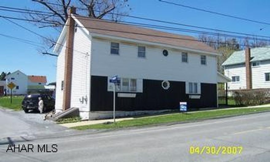 Two story vinyl sided, 4 bedrooms, 2 baths.