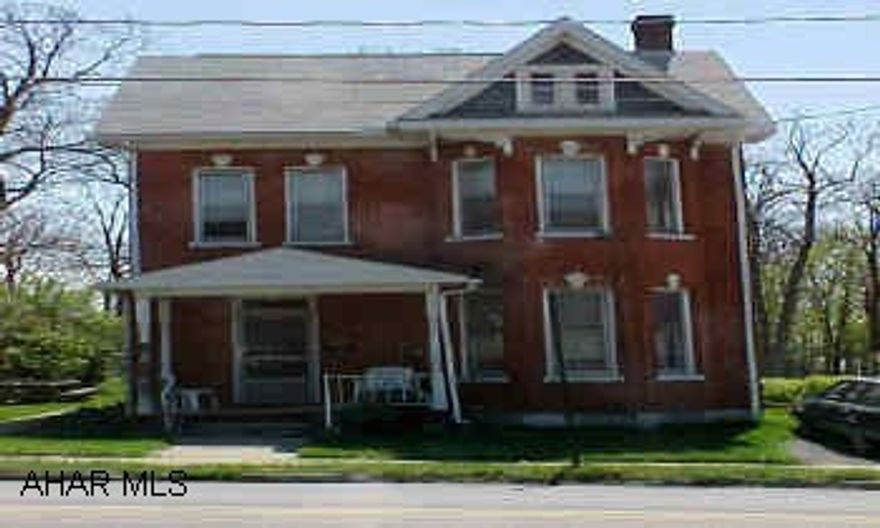 2 1/2 Story- Beautiful old brick home -Currently duplexed-updated wiring & plumbing Water & Electric have capability of being seperate- Currently all on one meter- Roof new 1997 Good Mechanics- Excellent investment