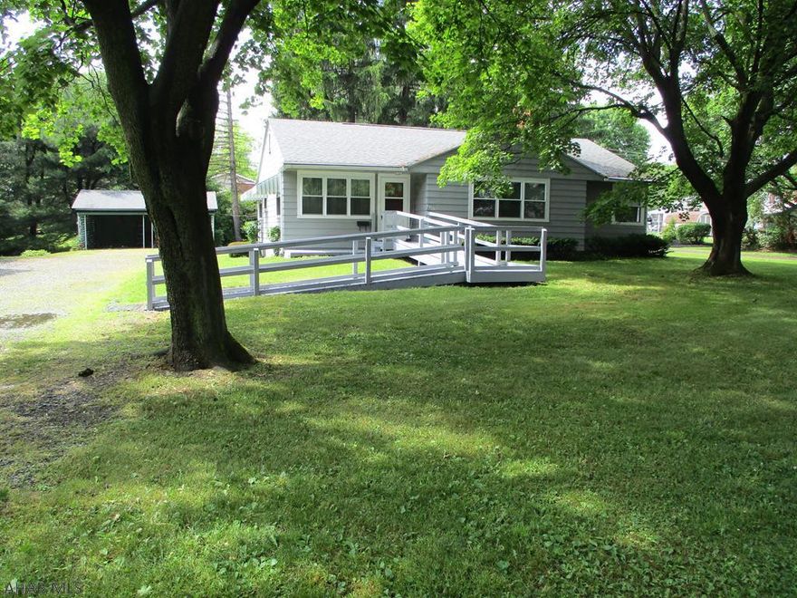 Great setting for this one story home on "L" shaped .52 acre.  Huge cement basement with fireplace could host a large family/rec room, lots of nice built-ins and crown molding, first floor laundry, 2 car carport.  Replacement windows in 2008, Trane GFA furnace, CA, shingle roof in 2008, Seller will remove ramp, if buyer doesn't want it.  Conveniently located in sought after Eldorado location.