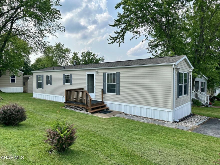 Simplicity at its best! Enjoy the 55 and over community of Friendship Village with all the amenities at your fingertips. Well maintained, move in ready, a 2009 Champion Home singlewide.  Open living room and kitchen with ample cabinetry, cathedral ceilings. Large closets in the bedrooms and convenient laundry area. New roof, shed w/electric and appliances included. Front and back porch and central AC.  Within minutes of our beautiful Downtown Bedford and stores for your convenience! This home is titled. Restrictions with in the community. New owner will need to be approved with Friendship Village.