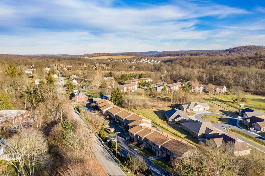 Great location near Sylvan Golf Course.  The kitchen offers plenty of cabinet space, along with a pantry and ceramic tile floors.  The large living room has a wood burning fireplace for your enjoyment and walks onto a large partially covered deck. The master bedroom is large, with two closets, has beautiful blinds and a large master bath, for your privacy.  Another full bath is on the second floor, along with two additional bedrooms..  The family room and laundry areas are in the basement.  HOA of $145.00 covers all exterior maintenance, lawn care, snow removal and trash.