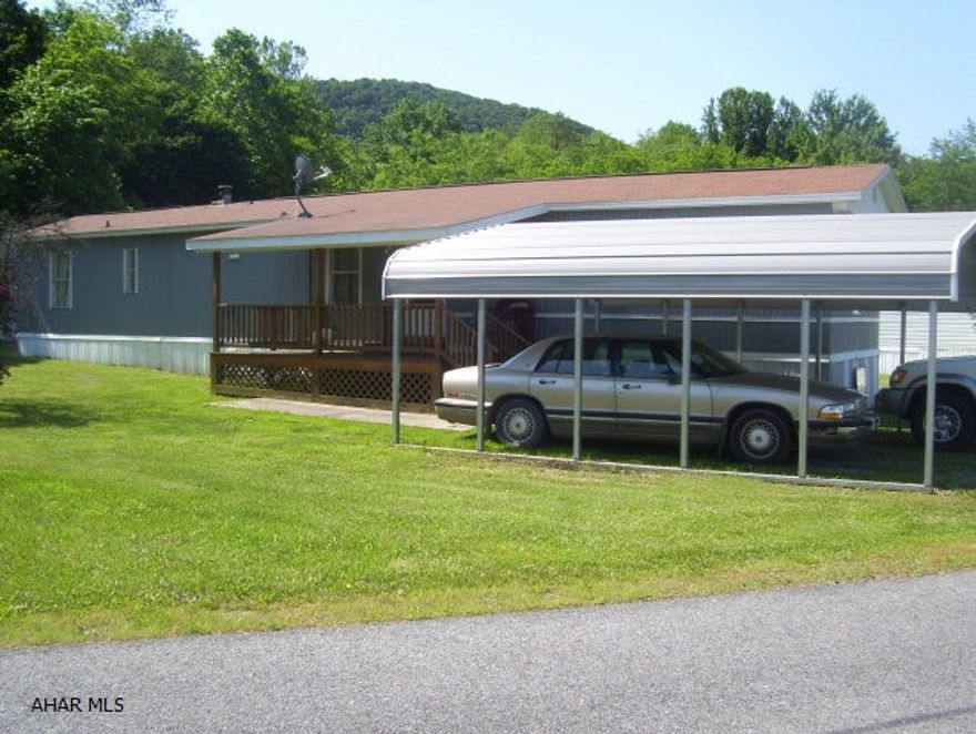 Well-maintained mobil home on rented lot in Mountain Manor Park in Saxton.  New shingled roof,new covered porch, well-insulated and air tight.