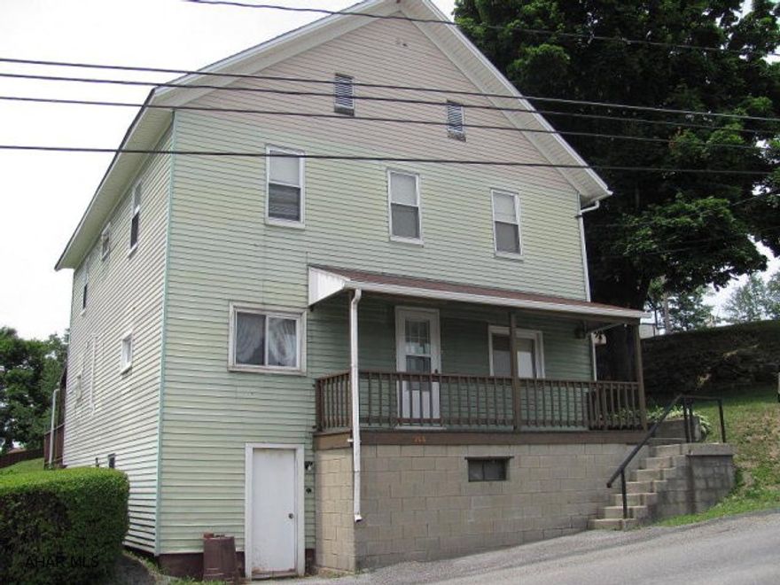 Carrolltown-2 story 4BR, 1  bath home on large corner lot. Huge eat-in kitchen, oil hot water radiator heat. Appliances included. Priced to sell