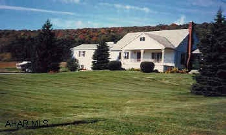 Nice 3 BR. 1 and 3/4 bath home on 15.4 Acres with scenic Mountain view. Home includes new kitchen, new windows, new roof, updated systems, DR,LV, FR with fireplace, int. garage. Appliances included in sale.