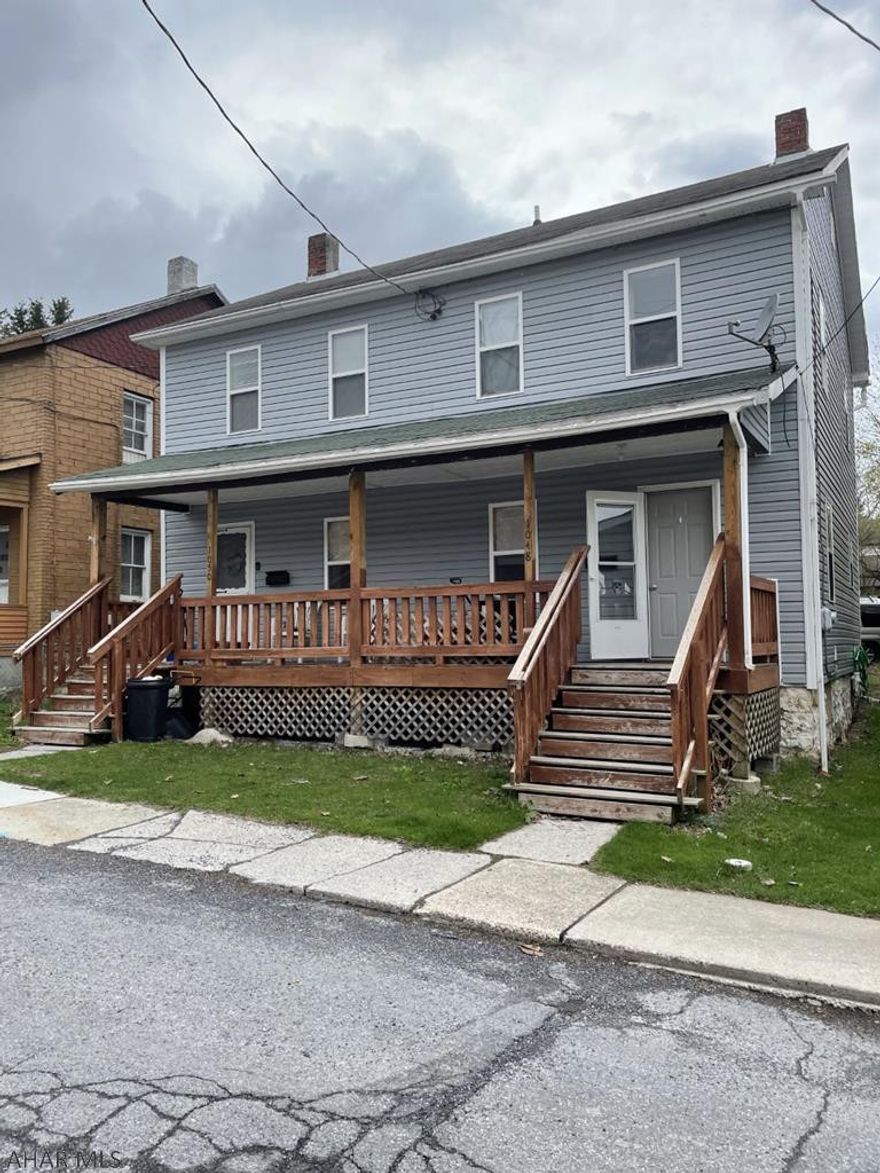 2 story vinyl sided duplex- 2BR, 1BA each. Each unit has separate utilities.  Tenants pay all utilities.  Newer natural gas furnaces in each side.  Great investment property & cash flow!  One side just emptied.  Ideal to live in one side and the other side pays the mortgage!