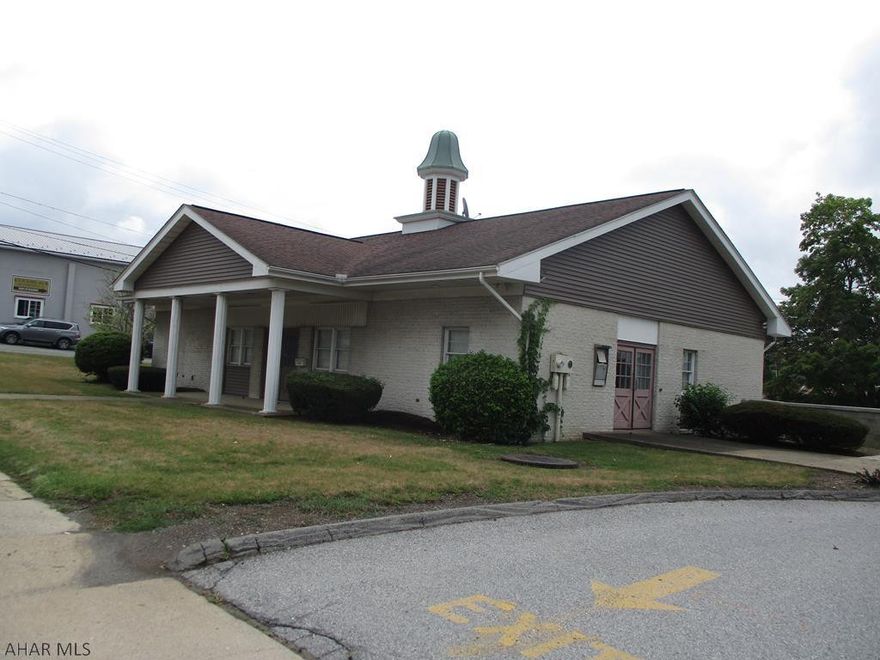 Well constructed one-story brick building. Built in 1973 as a bank branch 2400 SF Office Building on one acre with parking for approximately 40 vehicles. Property has a vault. Includes a 30' x 30' covered canopy for drive-thru capacity. All municipal utilities including gas and central air. Many Possibilities.