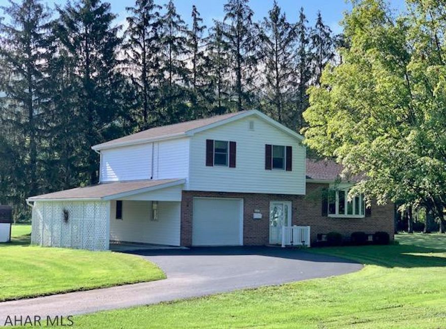 This meticulously maintained split level home rests on just over an acre and adjoins the Elks Golf Course!! Main level offers a large walk-in foyer, over-sized laundry room and an office/den. Second level has a living room with picture window and gas log fireplace, kitchen with breakfast bar and a dining room with a view of the golf course. Third level has a master bedroom with master bath, two additional bedrooms and another full bath. Heat pump with central air-conditioning, back-up electric BB heat, and 200-amp electric. One-car attached garage, one-car carport and a macadam driveway. Rear covered deck, ceramic tile patio and storage shed. Convenient to all amenities; walk over to the golf course, the country club, the tennis courts or downtown Bedford