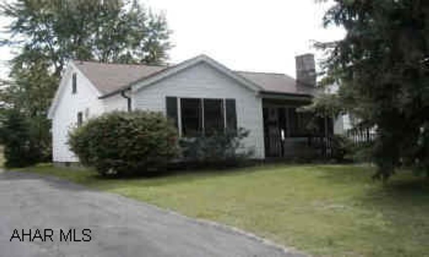 One story frame,front and rear porches. Detached garage.  New roof, large rear porch. All appliances. Hardwood under carpet. Well maintained. Has a full attic which could be finished for a 3rd bedroom.