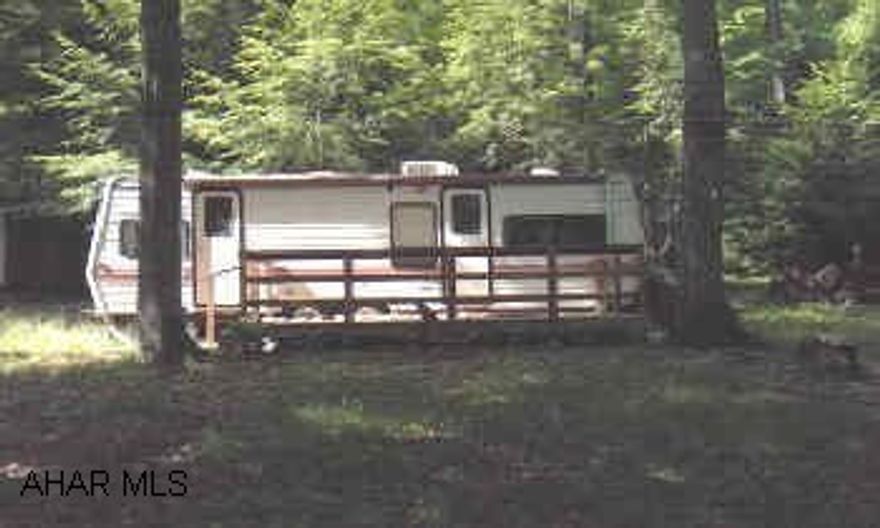 super nice 1993 camper on deeded lot.