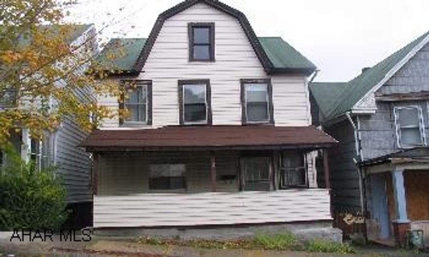 Handyman Special!! 3 Bedrooms 1.5 Bath,Living Room, Dining Room,Finished 3rd Floor(no Heat) Newer Furnance
