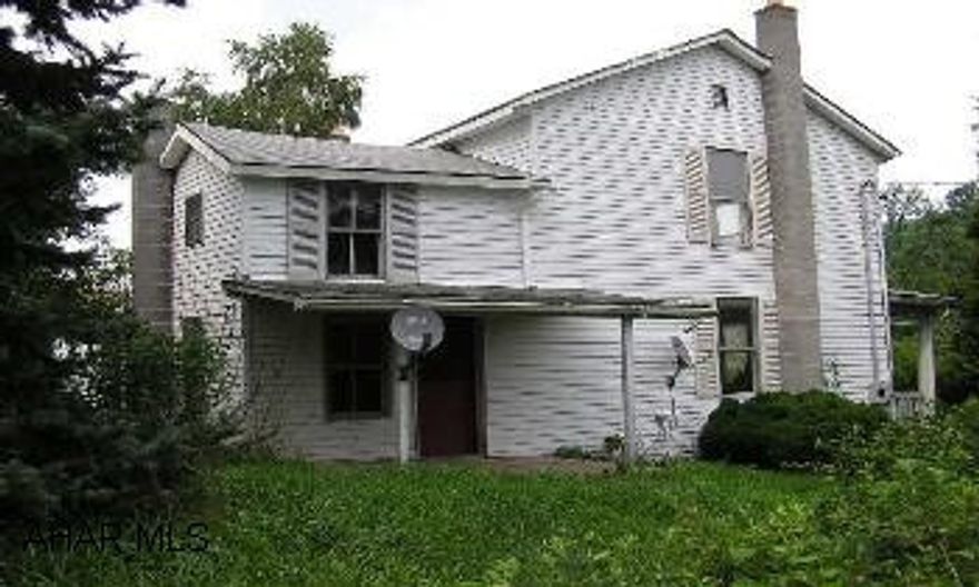 2-Story Frame/Vinyl, 4 BR/1.5 BA on half acre lot, full unfinished basement with good mechanics. Offered "AS-IS" Newer oil FA furnace, 200 amp electrical service and plumbing.