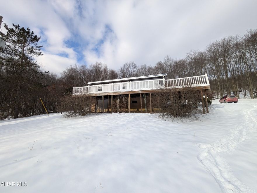 Northern Cambria double-wide fixer-upper on 4.4 acres. Loads of possibilities for handypersons. AS-IS sale. Seller will make no repairs. Property being sold to include all personal property and debris on property. AS-IS sale, seller will make no repairs. Buyer responsible for any municipal sewer testing and/or repair escrow.