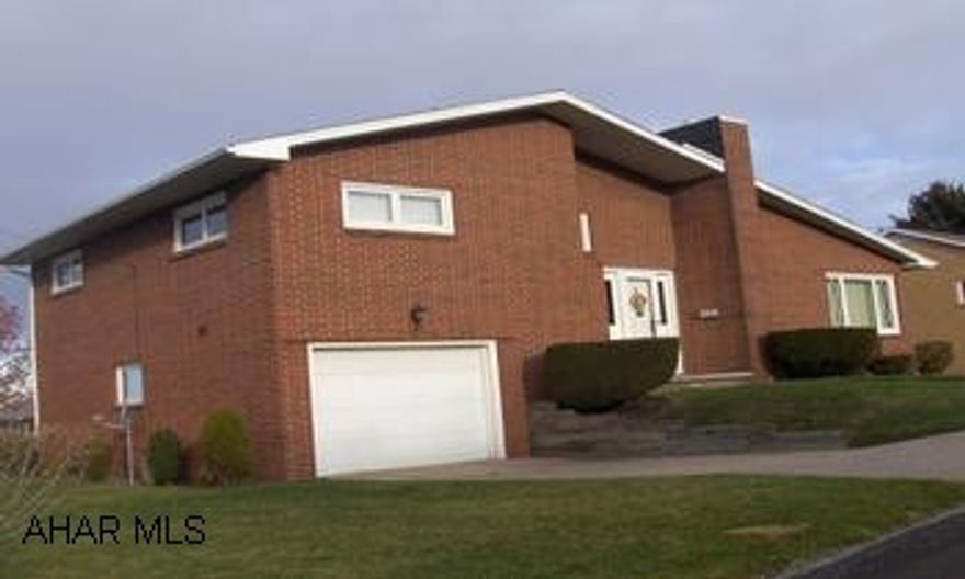 Brick tri-level home, move-in ready. New heating system recently installed. Mint condition three bedroom brick home. Extremely well maintained home. Beautifully landscaped corner lot! Great Location. Call Cathleen or Karen to view this fine home.