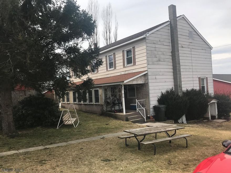 Owner lives in left side. Tenant on right side. This property is in fair condition. We do not have access to the tenant unit at this time. The sewer is handled by an older septic system. Public sewer is available at the property line.
