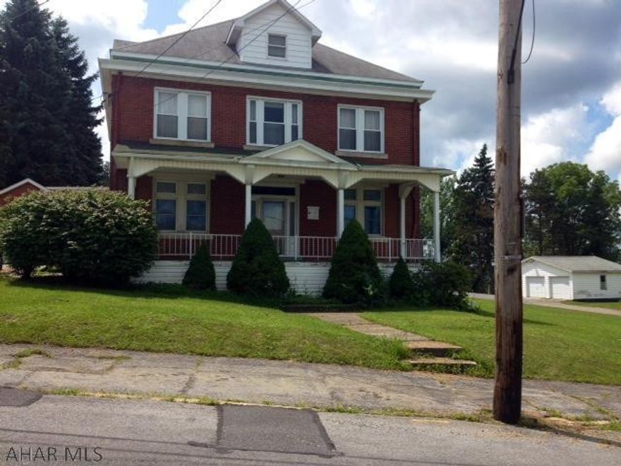 3 Story Brick home, front to back entry foyer on 1st and 2nd floor. Formal dining room, living room with original pocket doors, eat-in kitchen, office den, 1 1/2 bath, sitting room on 2nd floor with stained glass french doors, finished 3rd floor. New natural gas furnace. With some updated this home will be amazing. Being sold "As Is". Taxes are estimated.