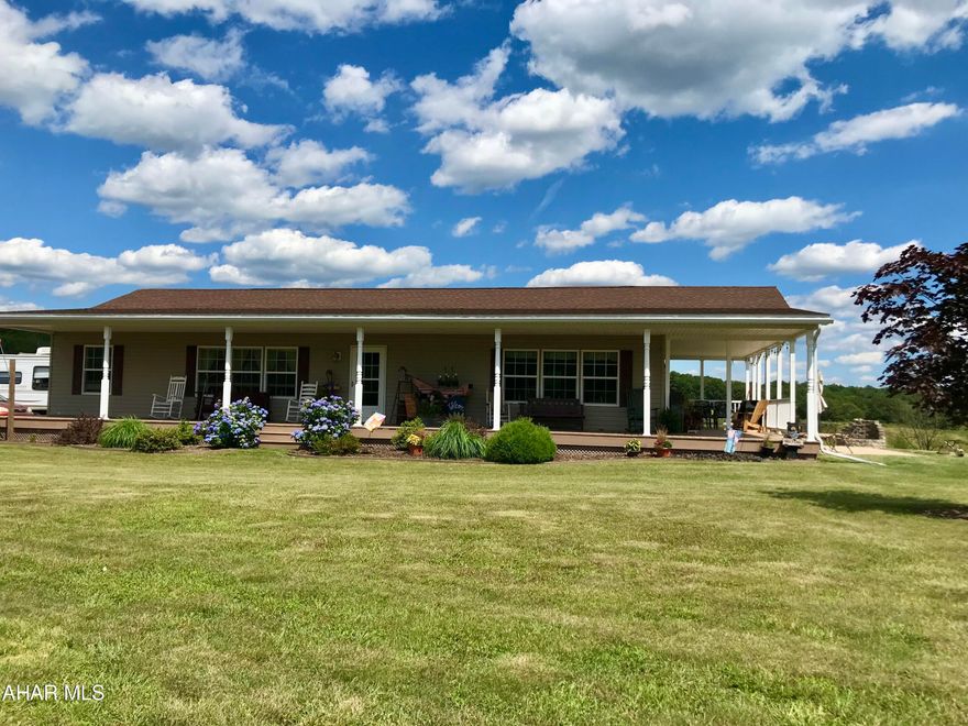 Beautiful rancher with awesome views all around. Move in ready with all appliances included. Almost 2 acres of level ground. Wrap around porch with country views of mountains and farm fields. Make this your country sanctuary.