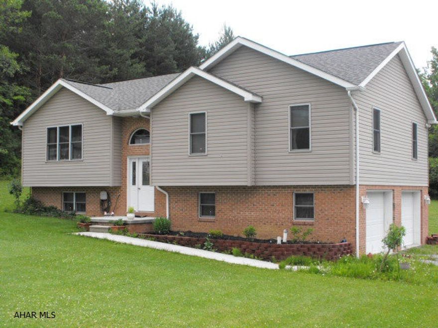 LR, DR, Kit is a 21x28 Great Room with vaulted ceilings (Very bright & airy) Oak cabinets in kit w/pantry. Main bath has whirlpool tub. Ceramic tile & hardwood floors.  Composite deck with retractable awning.  Super house on a nice lot.  Seller has home she wishes to purchase, so don't let the contingency scare you off.  Domestic gas hot water heat with central air condition.  Budget gas $66/mo.