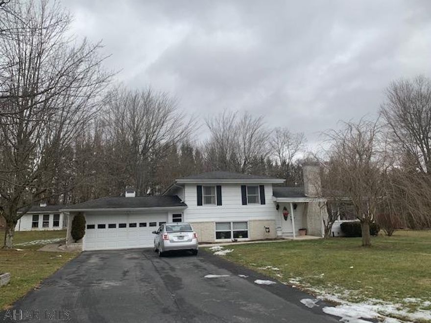 LOCATION, LOCATION, LOCATION- This multi - level home is located in a private development located on a dead end street. Also is situated on one of the largest lots in the development. Some updating needed but with some personal touches this home would be perfect due to size and location. There is also a detached workshop included.