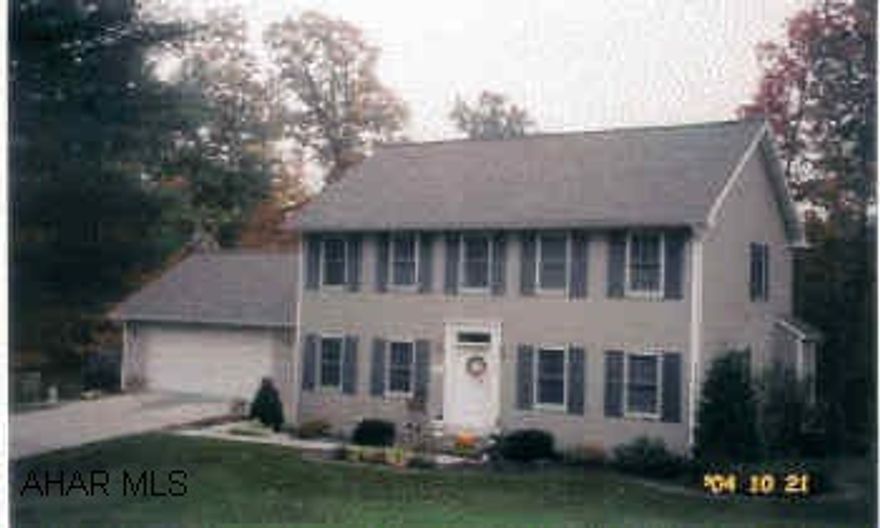 Two-story, 3BR/2 1/2BA, two-car garage and above ground pool. Beautiful landscaping. Home Warranty Included