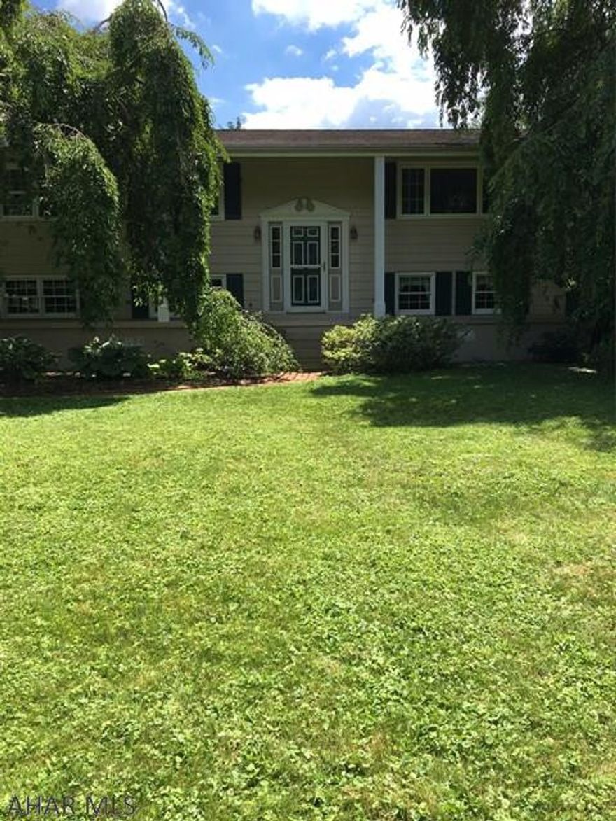 Beautiful and very well kept. Wait until you see the outdoor space! Stunning! Landscaped to perfection! Great covered deck and charming gazebo. Interior has new carpet upstairs. Laminate in dining room. Ceramic in foyer. Newly painted and bathrooms all updated, pretty kitchen, all appliances stay. Downstairs is finished with 3/4 bath, family room and exercise room. One car garage and extra parking for RV. All this on one acre lot. Whole house fan.