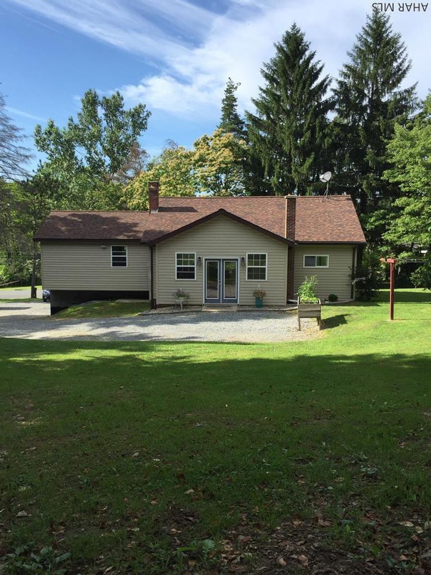Nicely updated 1 story home on 2 acres.  Home has been completely remodeled since 2012 including roof, windows, wiring, kitchen, baths, and new 1 story addition and extended garage.