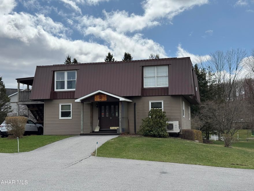 Multi use building (currently a dentist office) with a very nice 2br apartment on the second floor. This building has been well maintained and is in good condition. There is a full unfinished basement. Over 0.6 acre site with paved parking. Run your business here and live on top or use as rental.