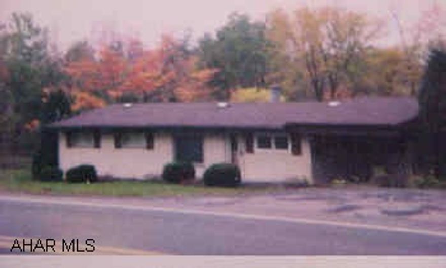 Immaculate 3 bedroom doublewide 9/10 acre plus 2 bedroom mobile home rented for $300 a month plus detached garage with beautiful efficiency apartment rented for $300 a month.  Motivated seller wants offer!