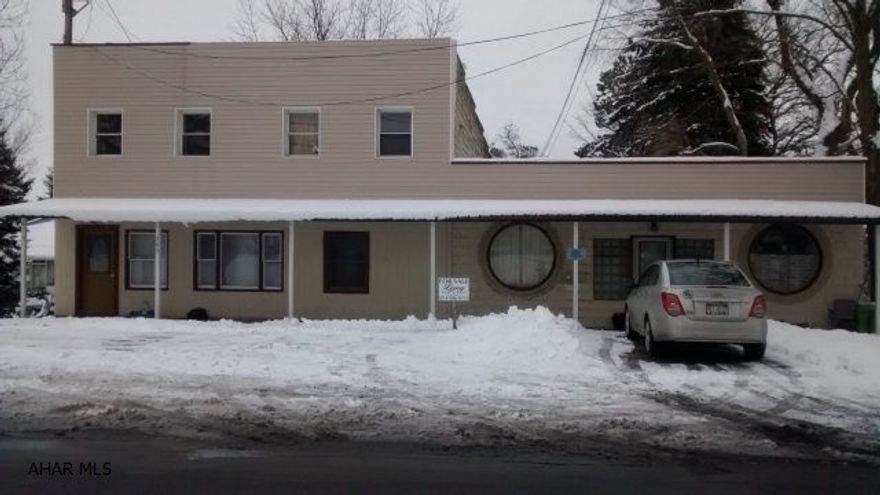 This 5 unit rental property is located near 2 universities and the county seat. All units also have washer/dryer hookups (provided washer/dryers in some units). Plenty of parking, units have 2 entrances. Currently coal heat that serves all units. City water/sewer serves all units. Seperate 100 amp service for each unit.