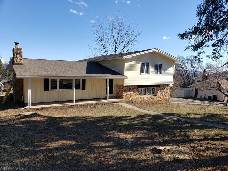 STUNNING 3 bedroom 2 bath multi level in Hollidaysburg.  This home has been remodeled top to bottom: siding, roof, furnace,  AC, plumbing, hot water heater, flooring,  bathrooms, kitchen, gas fireplace and much more! This home sits at the end of a quiet street waiting for a new owner. The large master has a full bath with private master deck entrance. The first floor open concept is perfect for entertaining!  3D Tour coming soon!