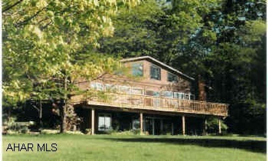 Spacious home with spectacular view sitting on 2.5 private ares, 5 bedrooms, 3 baths, open floor plan, large deck.