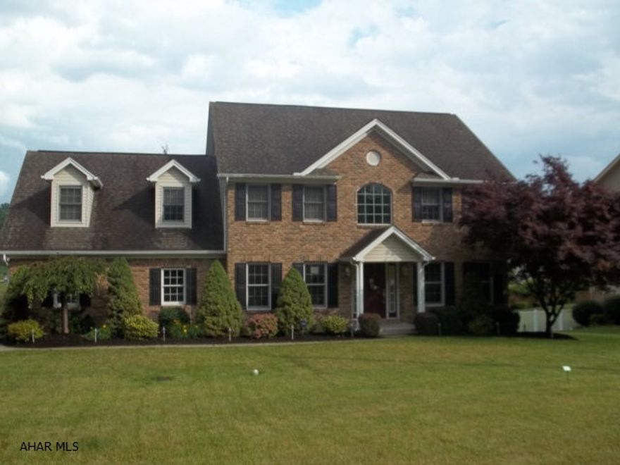 Bright & Cheery home in Pleasant View Estates with an open floor plan and many updates.  Check out the heated sun room and eat in kitchen with super large windows to take advantage of the view. Four bedrooms, 2.5 baths (the Master Bath has garden/jacuzzi tub and over sized shower and double sinks), foyer open to the second floor, second floor laundry is conveniently located.  Granite counters, hickory cabinetry, ceramic tile, open to family room with gas FP and super sun room, formal DR with hardwoods, newly fenced yard, new furnace with humidifier and electrostatic air filter, make this a must see home in the HASD. Priced to sell.