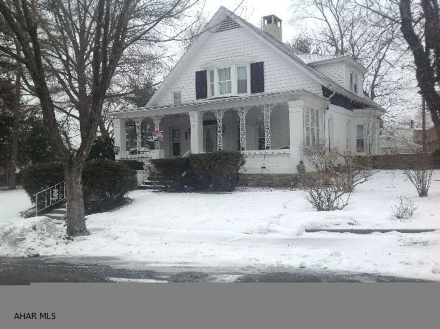 Large stately brick home on very large lot, 162 x 112, heated 2 car garage and extra off street parking. First floor is open with the focal point being the 3 sided fireplace which can be used in the living room, dining room and office. The Cherry kitchen has a bar and all appliances stay. There is a room in the back for toys, a pool table or just to watch TV. The upstairs has new flooring large closets and 2 baths. Great family home close to Penn State Altoona. The swing on the front porch stays.