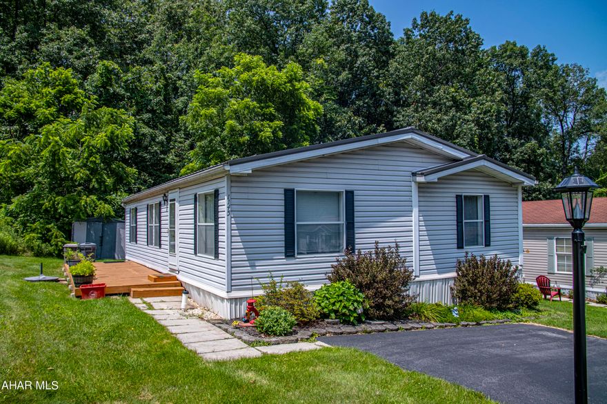 A ranch style manufactured home set in an alike home community. This 3 bedroom 2 bath home is located in Vista Woods with easy access on and off the I99 highway. This home offers a newly built deck for outdoor enjoyment and shed for additional storage. The living room is centrally located with an easy flow to all rooms. Master bath and a large walk in closet adds to the nice size master bedroom. Newly installed kitchen floor brightens up the open kitchen , appliances included as well as the washer and dryer in the utility room. Property not eligible for AirBnB.