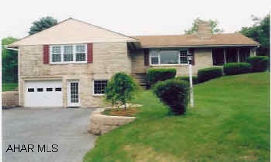 Shuttered Stone Ranch with 3 bedrooms, 2 full baths, finished basement.