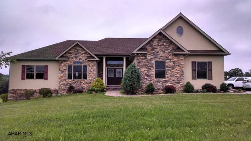 Absolutely beautiful home built by Bill Waltman. Stunning views on almost 42 acres in Chestnut Ridge School District. Open floor plan with hardwood floors, vaulted ceilings, skylights, granite countertops and custom cabinets. Master bathroom has his/her vanities, garden tub and double tray ceiling. Bonus room over garage with skylights. Must see to appreciate.