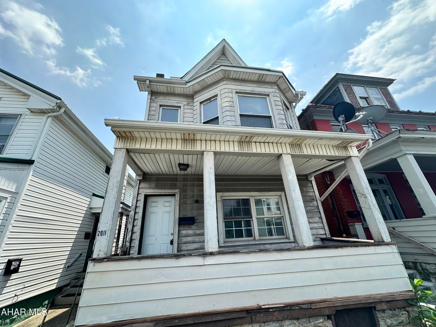 3 bedroom home with main floor laundry. Potential for a 4th bedroom if the attic were to be finished. The exterior needs some TLC but has a lot of potential. It was previously used for a rental investment property. There is a covered rear patio, small yard and off street parking.