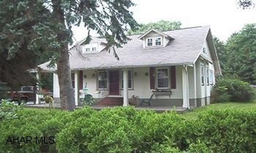 $1000 to agent who sells home by June 1, 2009. Oak hdwd floors, large LR w/FP, newer kitchen, fin. bsmt. w/laundry, 2 decks, pool, 2 car garage, great corner lot. Owner will consider AOA. $1000 to agent who sells home by June 1, 2009.  Llyswen area! This home is loaded with character! Oak hardwood floors, large LR w/FP, newer kitchen, 2 BR's & updated bath on 1st floor, 2 BR's & updated bath on 2nd floor, finished basement w/laundry, 1/2 bath, workshop, & storage, 2 decks, in-ground pool, firepit, volleyball, horseshoe pits, apple trees, & 2 car detached garage. Great corner lot 147x137. Owner will consider Article of Agreement. See agent for details.