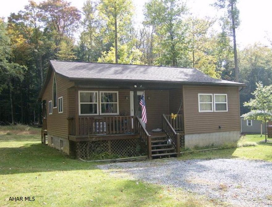 Possible short sale. 1 story 2 BR, 1 3/4 bath home on 0.59 acre lot in Glendale Yearound.