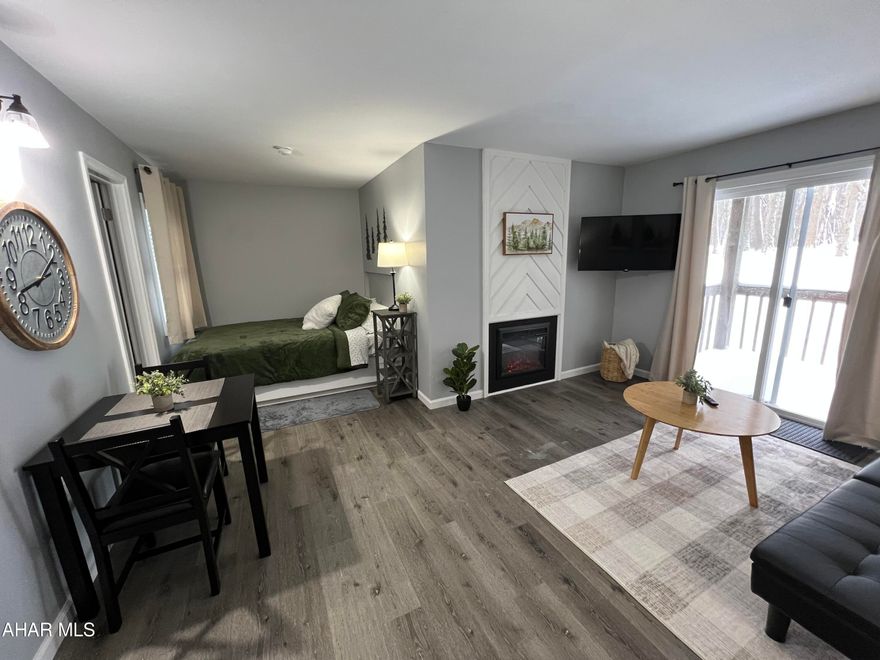 Cozy, Turnkey 1st floor studio in the Allegheny Mountains at Blue Knob All Seasons Resort has everything you need. Completely remodeled and fully furnished. New kitchen cabinets countertops, windows, sliding door, flooring and appliances. Cuddle up next to the fireplace while enjoying the view from the siding doors. The feature wall brings a warm and inviting feel.   Walking distance to indoor pool/hot tub, outdoor pool and The Club House Bar & Grille. Blue Knob is the 2nd highest mountain and highest skiable mountain in Pennsylvania! In addition to an array of winter activities, Blue Knob also has a full-service all seasons Conference Center for weddings and events, they also offer golf, swimming and multitude of trails for hiking, running, and mountain biking. Visit https://blueknob.com/activities-events/ to see all the fun events that are happening at Blue Knob. $255.00/ Mo HOA fee includes: pools, hot tub and gym area, tennis and pickle ball courts, building, property maintenance & garbage. *Conference center, Golf and Ski resort is not included in HOA fee. *