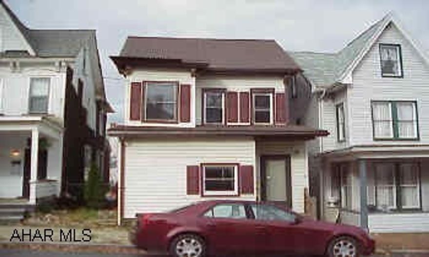 Large house with lots of potential.  1/2 bath and laundry on 1st floor.  Modern kitchen.  "BRING ALL OFFERS"!