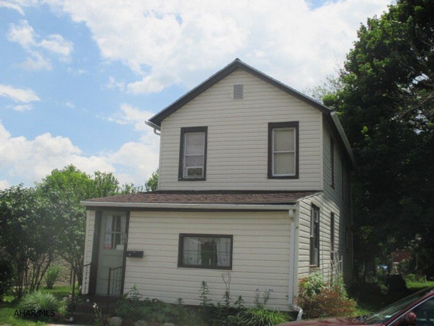 Great location for this 2 story Bellwood home featuring an enclosed front porch, covered back porch, and spacious eat in kitchen.  New water heater installed 2010, new furnace installed 2010, and new roof 2009. Needs some TLC but has lots of potential! Very motivated seller will look at any offers.