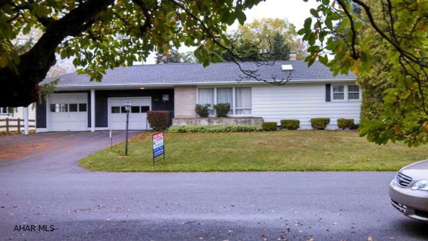 Freshly painted, well-built, super-sized 3BR ranch home in Eldorado. New kitchen make-over includes new HW floors and granite counter top. Upgraded from 2 to 3 bedrooms. Pristine garage. Private covered patio with block half-walls has built-in wet bar and barbecue area w/flue. Concrete out-building could be a man cave, potting shed/storage area, or clubhouse for kids. Large paved area in the backyard is a regulation-sized shuffle board court. Could build a pavilion or pergola on it. Family room  comes equipped with a hand-made wet bar and gas fireplace with stone mantle. Family room walls are made of barn wood and brick.  Stone planter attached to front of house and brick planter attached to rear patio. Roof shingles 6 years old. Home warranty included. Motivated Seller. Bring offers