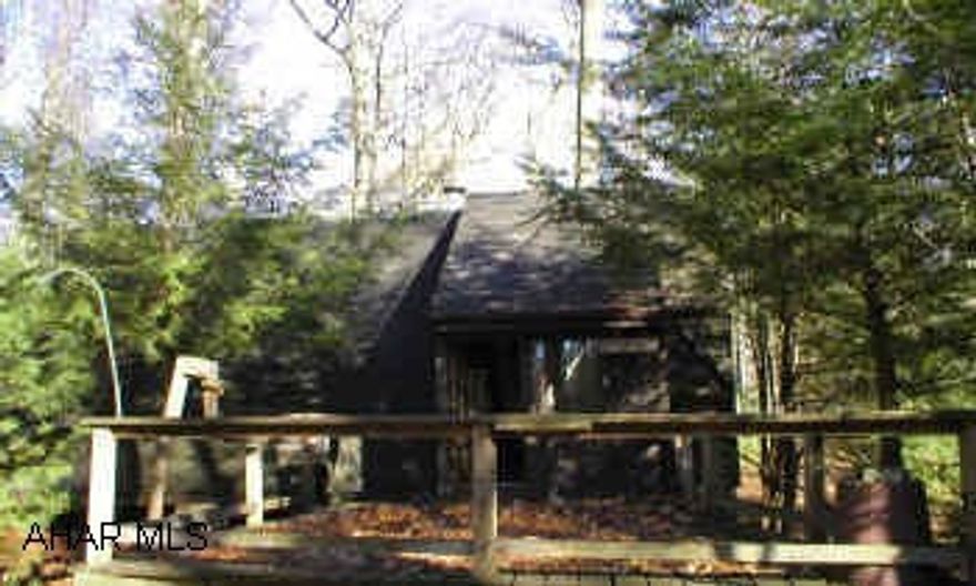 A frame on leased ground (State Lease) in Rothrock State Forest Hunting Camp with Deer , Bear, And Turkeys- Snowmobile Access Right out Front Door.
