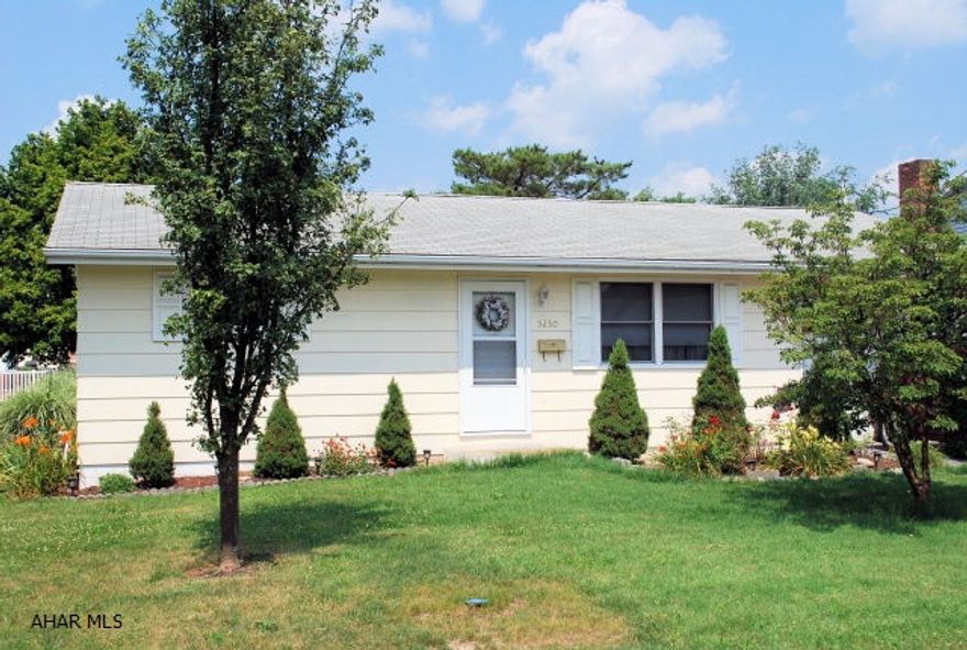 Cute two bedroom ranch in move-in condition.  Hardwood floors. Clean, dry basement.  New furnace and windows.  Attached garage. Quiet street in Eldorado.